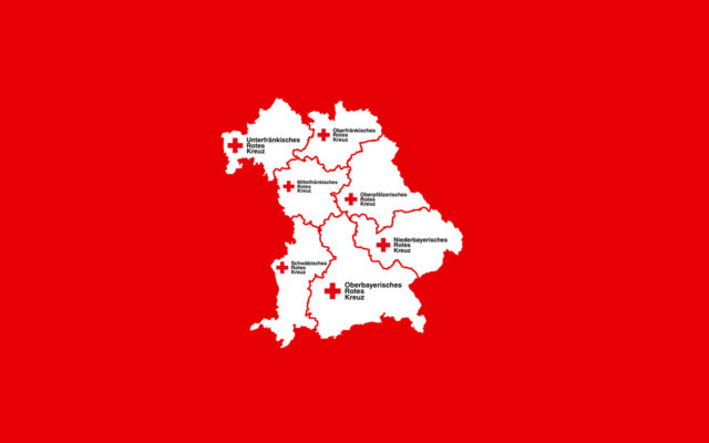 Karte der bayerischen Regierungsbezirke. Mit veränderten Logos des BRKs, passend zu den Regierungsbezirken.
